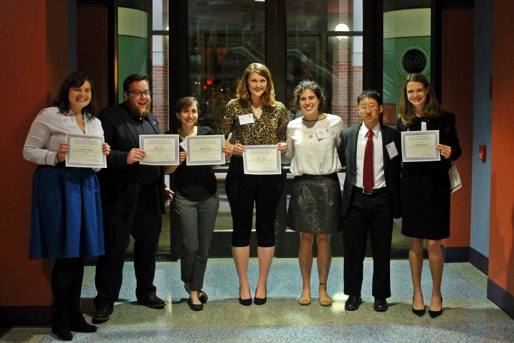 Winners of the Graduate Student 90-Second Thesis Competition are (from left) Catherine Majors, Blake Earle, Yasmin Chebaro, Lynn Fahey, Gisele Calderon, Eric Yang and Samantha Paulsen. (Photo by Josh Hill)